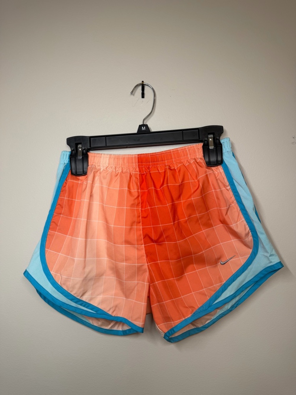 Nike Women's Orange Grid Athletic Shorts with Blue Trim